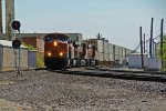 BNSF 7489 Slows for a crew change,